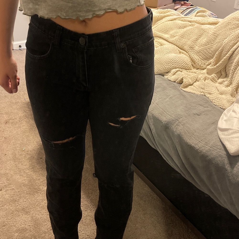 ripped straight leg Levi jeans